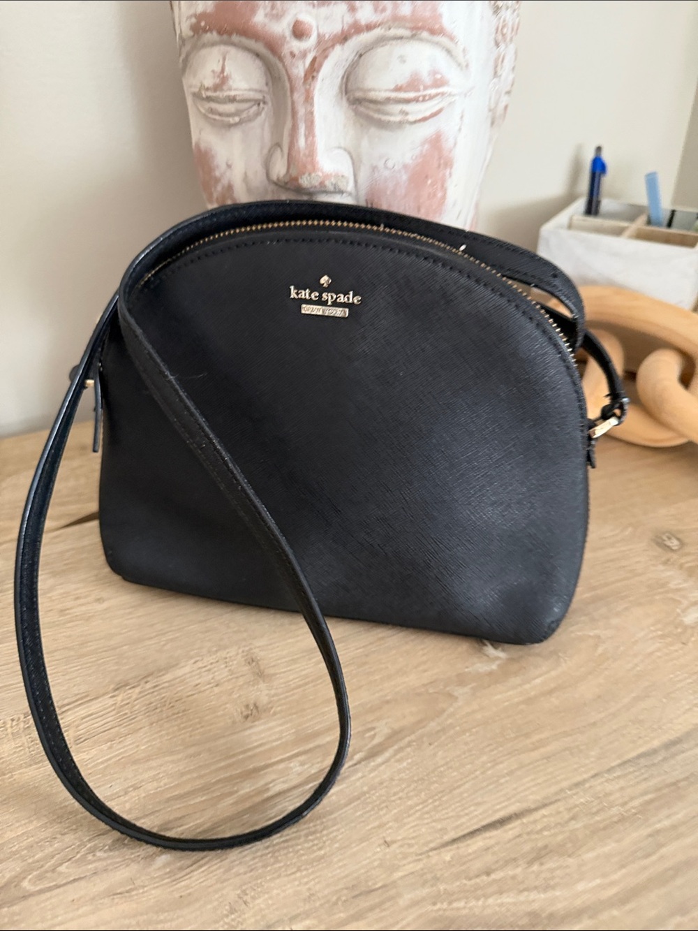 kate spade black saffiano dome crossbody with gold logo